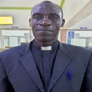 Rev John Muhangi